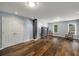 Spacious basement with plank flooring, lighting, and large closets at 2425 Hamptons Psge, Alpharetta, GA 30005