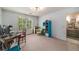 Bedroom with hardwood floors, lots of light and adjacent bath at 2425 Hamptons Psge, Alpharetta, GA 30005