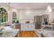 Modern kitchen with stainless steel appliances, granite counters, and ample cabinetry at 2425 Hamptons Psge, Alpharetta, GA 30005