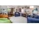 Cozy living room featuring a fireplace, plush seating, and an open layout at 2425 Hamptons Psge, Alpharetta, GA 30005