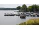 Picturesque marina with numerous boats docked on a serene lake, framed by lush greenery at 2425 Hamptons Psge, Alpharetta, GA 30005