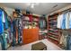 Walk-in closet with custom shelving and ample storage space at 2425 Hamptons Psge, Alpharetta, GA 30005