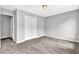 Neutral bedroom featuring carpeted floors, closet, and gray walls providing a cozy and inviting space at 2584 Shadowbrook Dr, Decatur, GA 30034