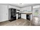 Spacious kitchen featuring modern black appliances and ample counter space at 2584 Shadowbrook Dr, Decatur, GA 30034