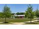 Green community space with small businesses at 515 Cohen St, Atlanta, GA 30310