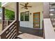 Inviting front porch with wood-look ceiling and decorative front door at 515 Cohen St, Atlanta, GA 30310