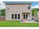 Image of a backyard features a patio, some toys, and is surrounded by a wooden privacy fence at 5225 Stonehaven Vw, Cumming, GA 30040
