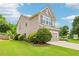 Attractive two-story home with a well-manicured lawn and a two car garage at 5225 Stonehaven Vw, Cumming, GA 30040