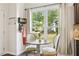 Cozy breakfast nook with table and chairs, bathed in natural light and offering a view of the outdoors at 5225 Stonehaven Vw, Cumming, GA 30040