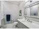 Updated bathroom with gray vanity, quartz countertop, and a tiled shower at 604 Timm Valley Ne Rd # A, Atlanta, GA 30305