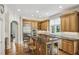 Spacious kitchen with wood cabinets, stainless steel appliances and a large center island at 604 Timm Valley Ne Rd # A, Atlanta, GA 30305