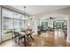 Bright living room with hardwood floors, large windows, and an open floor plan at 604 Timm Valley Ne Rd # A, Atlanta, GA 30305