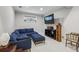Basement living room featuring recessed lighting, a modular couch, and a vintage radio cabinet at 604 Timm Valley Ne Rd # A, Atlanta, GA 30305