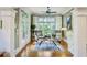 Cozy sitting area with hardwood floors, large windows, and access to porch at 604 Timm Valley Ne Rd # A, Atlanta, GA 30305