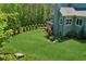 Expansive backyard with mature trees offering shade and a tranquil setting at 1393 Kings Park Nw Dr, Kennesaw, GA 30152