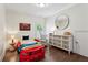 bedroom featuring hardwood floors, a fun car-shaped bed, and modern decor at 1393 Kings Park Nw Dr, Kennesaw, GA 30152