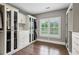 This spacious closet features custom storage and hardwood floors at 1393 Kings Park Nw Dr, Kennesaw, GA 30152