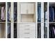 This spacious closet features custom storage and hardwood floors at 1393 Kings Park Nw Dr, Kennesaw, GA 30152