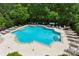 The community pool is spacious and features plenty of lounge seating at 1393 Kings Park Nw Dr, Kennesaw, GA 30152