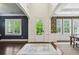 Bright, open foyer with hardwood floors and elegant decor leading to various living spaces at 1393 Kings Park Nw Dr, Kennesaw, GA 30152