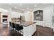 Well-appointed kitchen with granite countertops, modern appliances, and seamless flow into the living space at 1393 Kings Park Nw Dr, Kennesaw, GA 30152