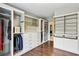 Spacious walk-in closet offering a variety of storage solutions with shelving, drawers, and hanging space at 1393 Kings Park Nw Dr, Kennesaw, GA 30152