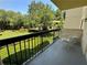 Balcony with seating area overlooking well-maintained garden and landscaping at 1800 Clairmont Lk # 213, Decatur, GA 30033