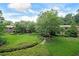 Beautifully landscaped lawn and path through the property grounds on a sunny day at 1800 Clairmont Lk # 213, Decatur, GA 30033