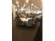 Elegant dining area filled with tables set for meals and social gatherings at 1800 Clairmont Lk # 213, Decatur, GA 30033