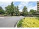 Circular driveway and well-manicured landscaping leading to the building's entrance at 1800 Clairmont Lk # 213, Decatur, GA 30033
