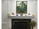 Fireplace with a collection of colorful teapots displayed on the mantle at 1800 Clairmont Lk # 213, Decatur, GA 30033