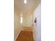 Inviting foyer with hardwood floors and view into the living space at 1800 Clairmont Lk # 213, Decatur, GA 30033