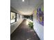 Bright hallway featuring large windows and colorful artwork, creating an inviting and visually appealing space at 1800 Clairmont Lk # 213, Decatur, GA 30033