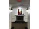 Grand hallway with a marble fireplace and decorative lighting, offering a warm and inviting ambiance at 1800 Clairmont Lk # 213, Decatur, GA 30033
