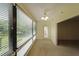 Bright living room with large windows offering views of the well-maintained lawn at 1800 Clairmont Lk # 213, Decatur, GA 30033