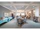 Spacious community living area with coffered ceilings and multiple seating arrangements at 1800 Clairmont Lk # 213, Decatur, GA 30033