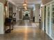 Elegant lobby featuring decorative columns, tiled floors, and a fireplace in the background at 1800 Clairmont Lk # 213, Decatur, GA 30033