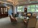 Comfortable lounge area with a chandelier, plush seating, and large windows offering natural light at 1800 Clairmont Lk # 213, Decatur, GA 30033