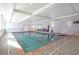 Indoor swimming pool area with tile flooring and ample natural light at 1800 Clairmont Lk # 213, Decatur, GA 30033