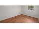 Bedroom featuring hardwood floors and a window at 24 Dunwoody Springs Dr, Atlanta, GA 30328