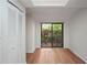 Dining room featuring wood floors, a sliding glass door, and ample natural light at 24 Dunwoody Springs Dr, Atlanta, GA 30328