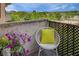Scenic balcony with comfortable seating, showcasing beautiful floral arrangements and an urban skyline at 300 Johnson Ferry Ne Rd # A706, Atlanta, GA 30328