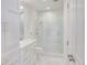 The bathroom features a marble countertop vanity, a seamless glass shower, and white tile at 300 Johnson Ferry Ne Rd # A706, Atlanta, GA 30328