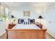This bedroom features a wooden sleigh bed, decorative pillows, and two matching wooden nightstands at 300 Johnson Ferry Ne Rd # A706, Atlanta, GA 30328