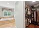 Bathroom featuring a closet, tile floors, and a standalone tub with window at 680 Parkside Trl, Marietta, GA 30064