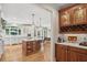 Open kitchen concept featuring hardwood floors, a large island with a sink, and lots of counter space at 680 Parkside Trl, Marietta, GA 30064