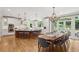 Gourmet kitchen with large island, stainless appliances, white cabinetry, and an adjacent breakfast area at 680 Parkside Trl, Marietta, GA 30064