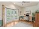Bright office with bay windows, hardwood floors, and a comfortable work space at 680 Parkside Trl, Marietta, GA 30064