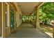 Spacious front porch with views of the surrounding greenery, offering a peaceful and serene outdoor living space at , Atlanta, GA 30310