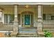 Welcoming front porch with a classic design, providing a cozy and inviting entrance to the home at , Atlanta, GA 30310